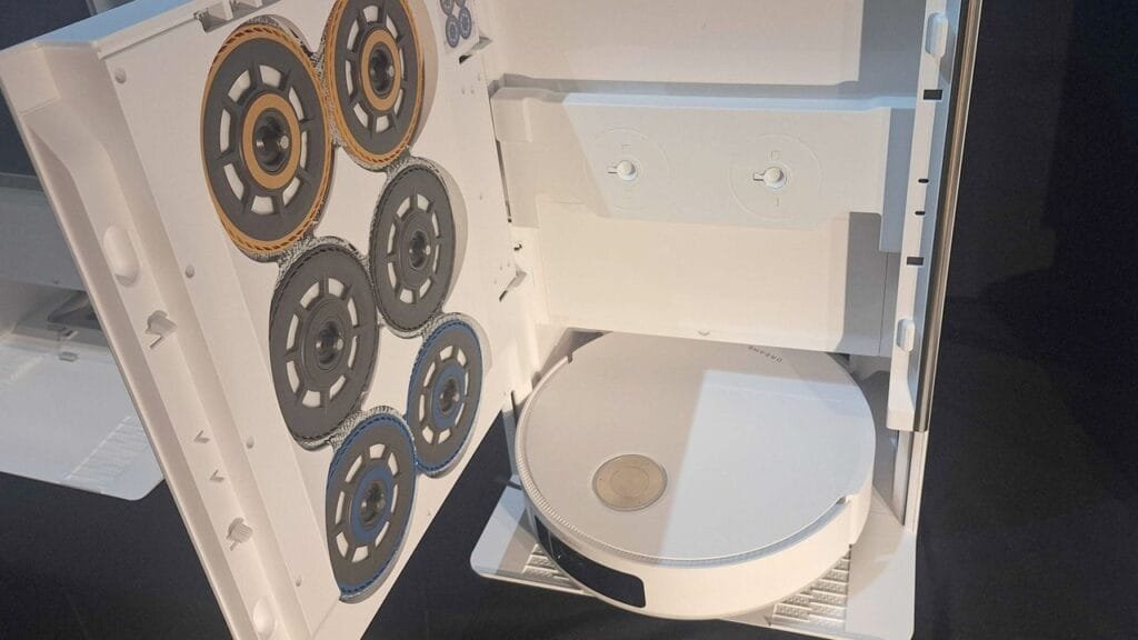 I’m equal parts impressed and intimidated by this new robovac’s vending machine-style mopping setup